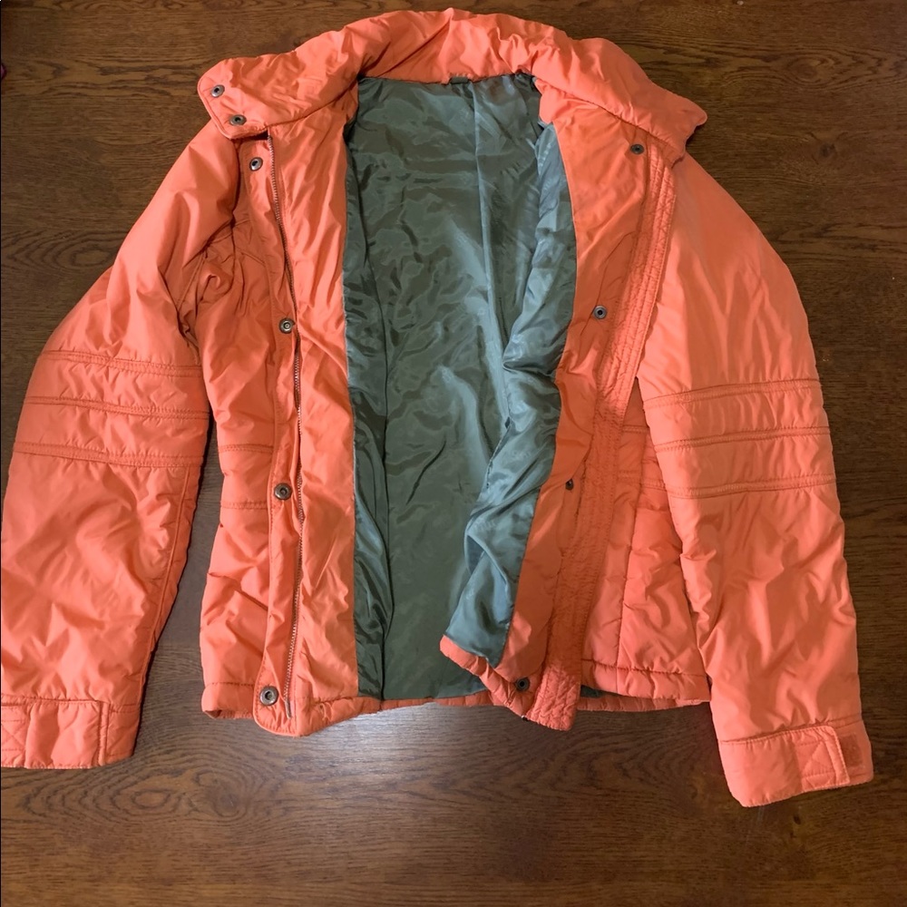 Orange coat by Lilu.